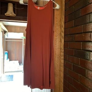 Size large very comfy summer dress! Flowing and rustic orange color